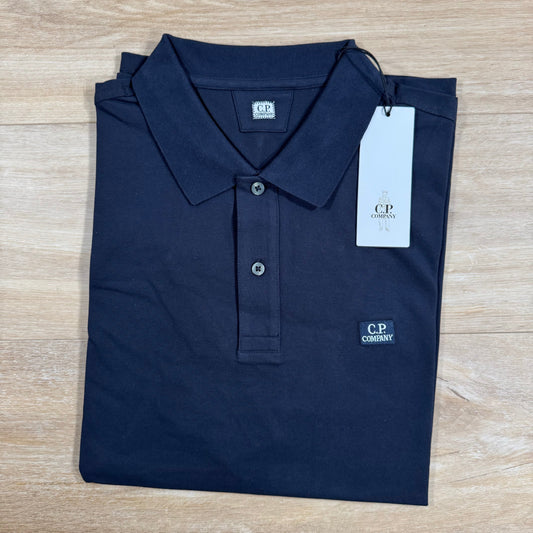 CP Company Stretch Piquet Logo Polo Shirt in Black Sand Castmark