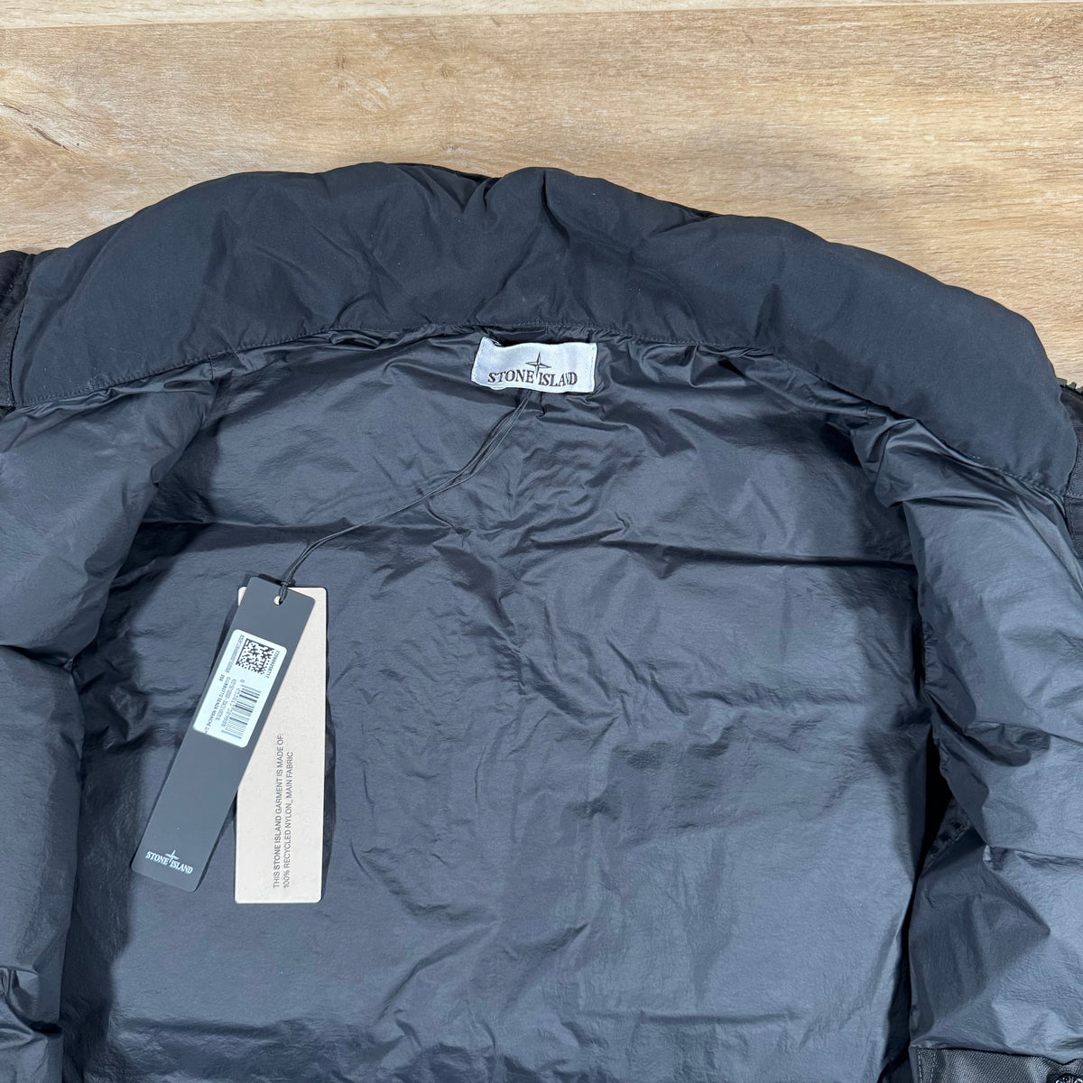 Stone Island Crinkle Reps NY Nylon Down Vest in Black Castmark