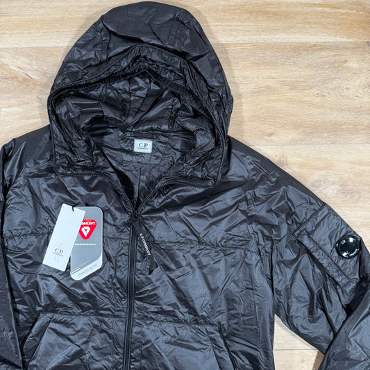 CP Company Nada Shell Lens Padded Jacket in Black Castmark