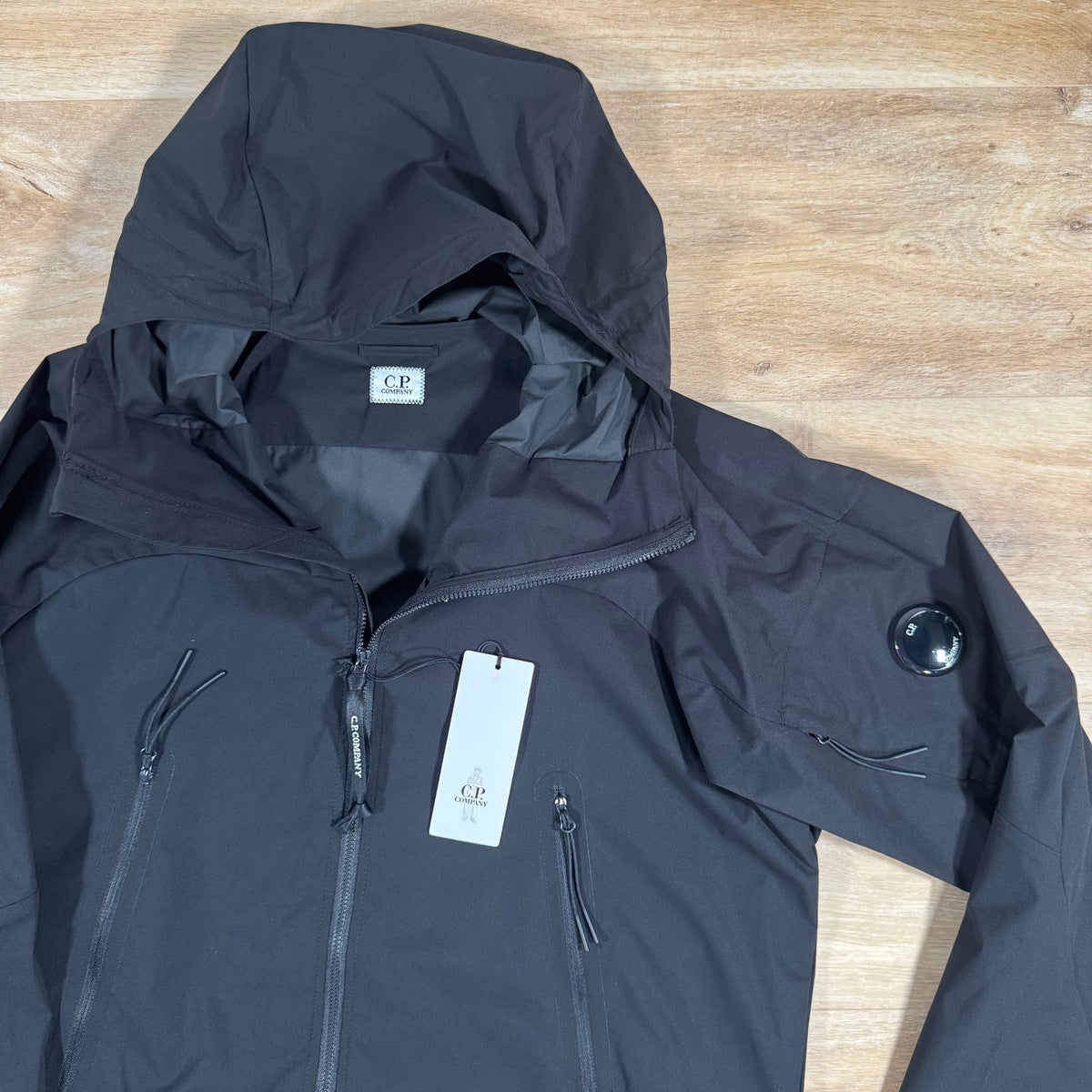 CP Company Pro-Tek Lens Jacket in Black Castmark