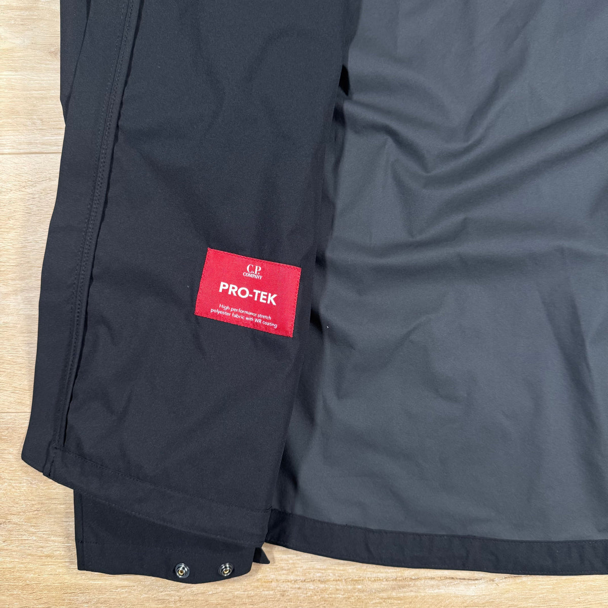 CP Company Pro-Tek Lens Jacket in Black Castmark