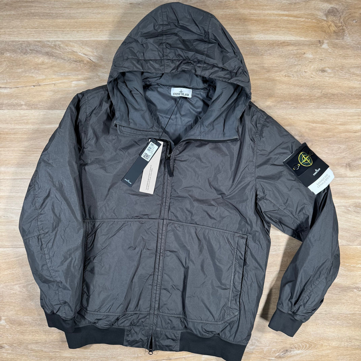 Stone Island Crinkle Reps NY Padded Jacket in Lead Grey Castmark