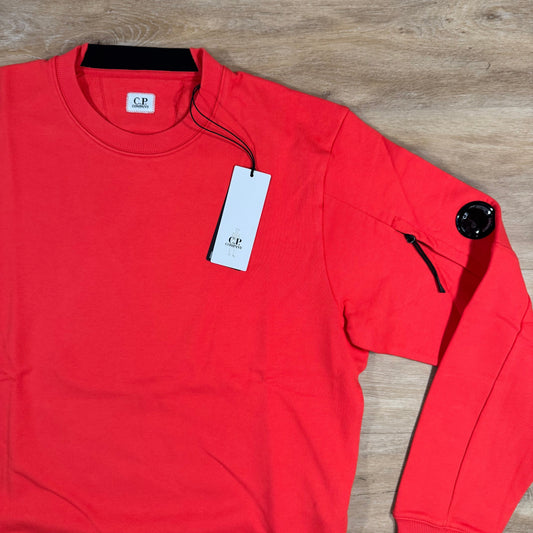 CP Company Diagonal Raised Fleece Lens Sweatshirt in Poinciana Orange Castmark
