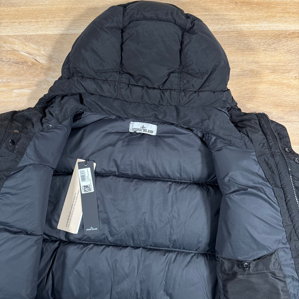 Stone Island Nylon Metal Down Jacket in Black Castmark