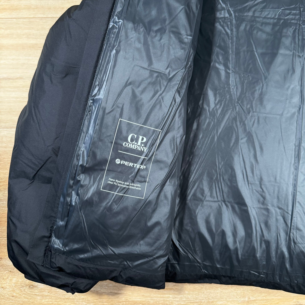 CP Company Metropolis Pertex Down Jacket in Black Castmark
