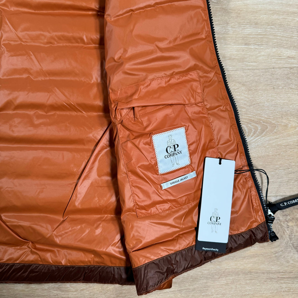 CP Company DD Shell Goggle Down Vest in Bombay Brown Castmark