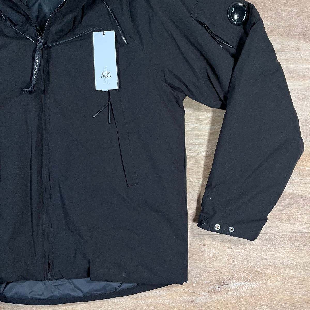 CP Company Pro-Tek Padded Lens Jacket in Black Castmark