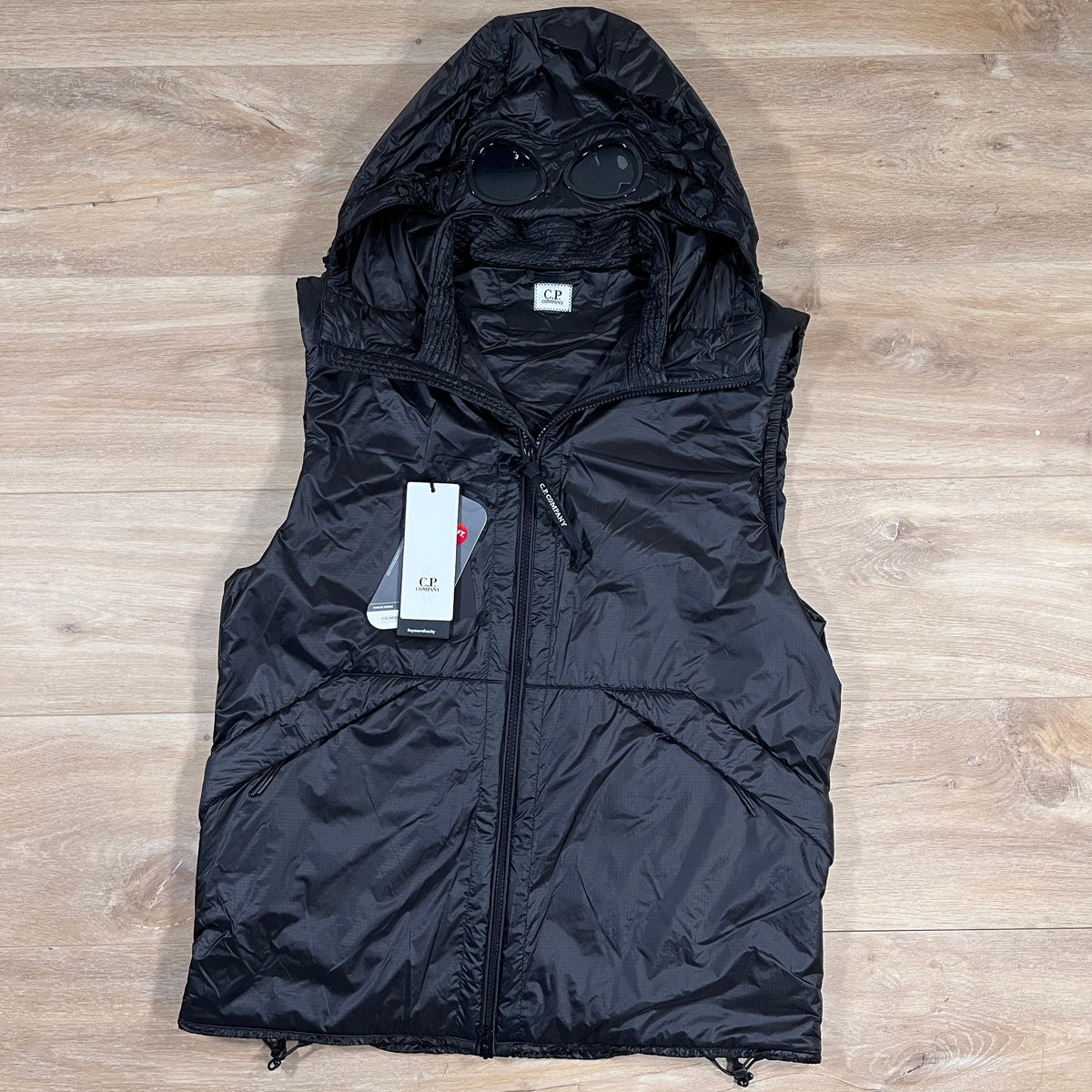 CP Company Nada Shell Goggle Padded Gilet in Black Castmark