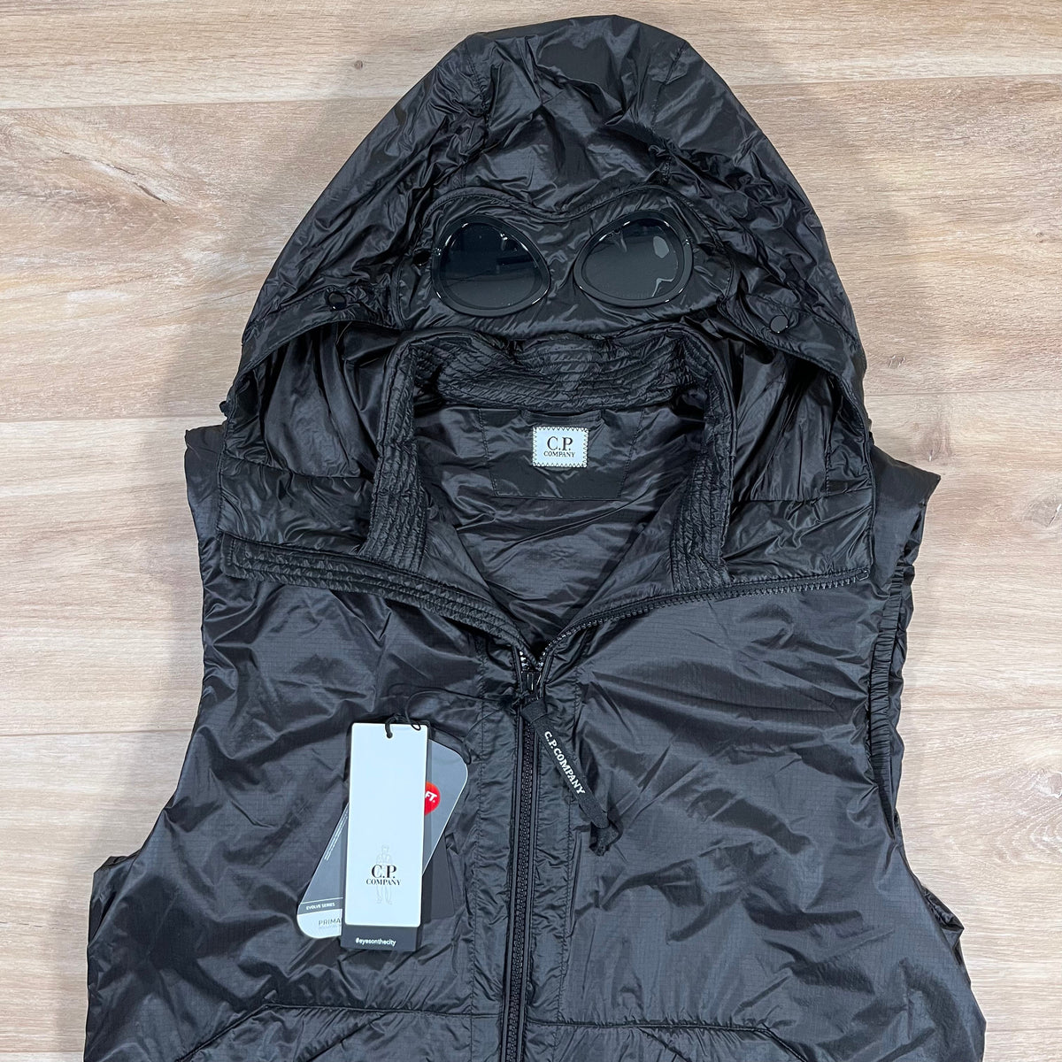 CP Company Nada Shell Goggle Padded Gilet in Black Castmark