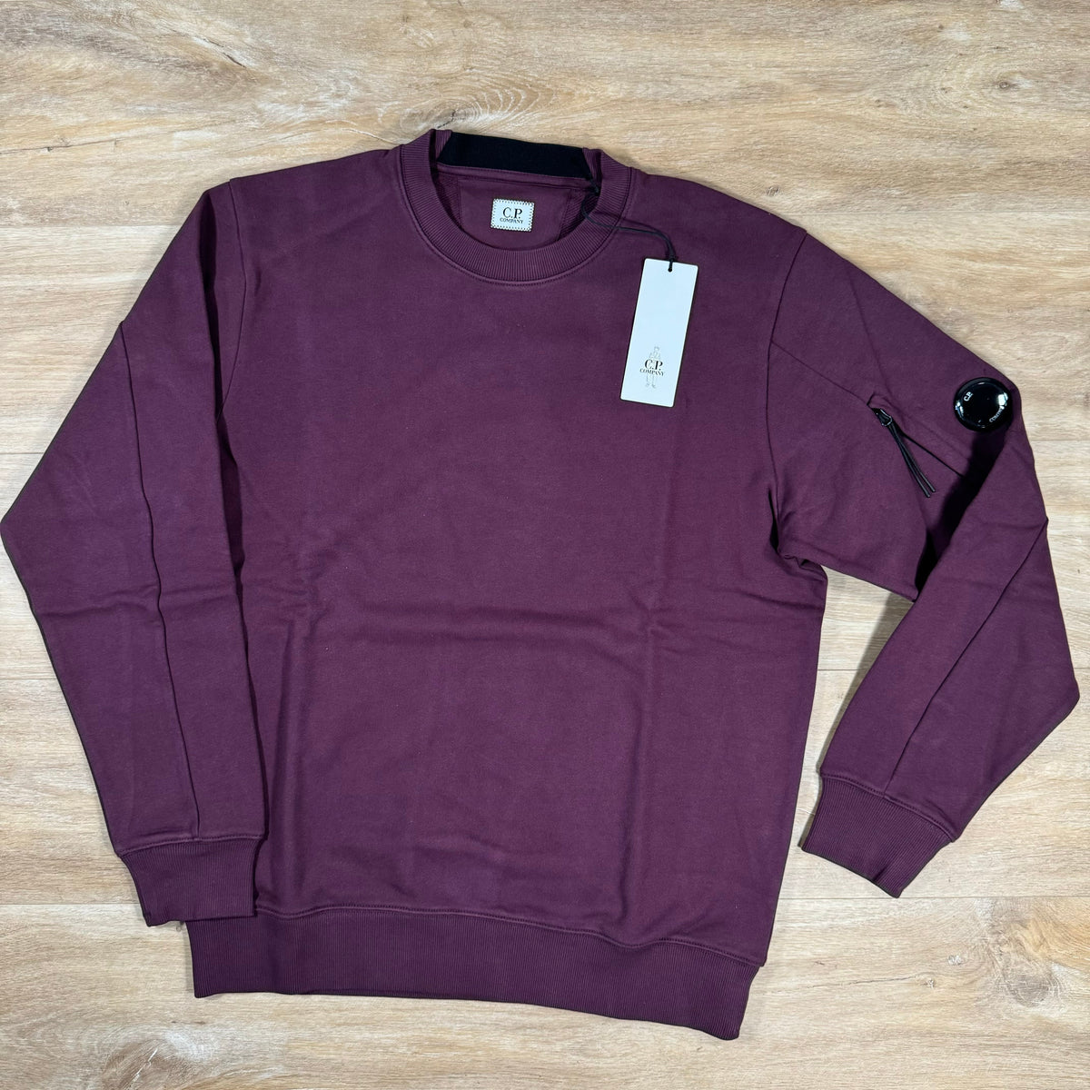 CP Company Diagonal Raised Lens Sweatshirt in Potent Purple Castmark