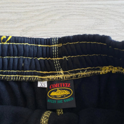 CORTEIZ All Over Print Joggers - Black/Yellow