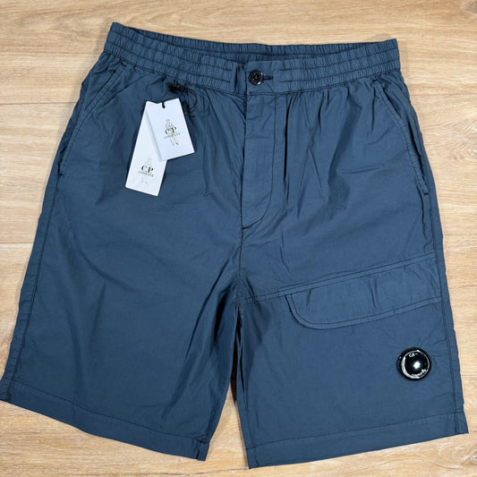 CP Company 50 Fili Stretch Cargo Shorts in India Ink Castmark