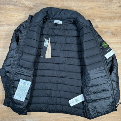 Stone Island Loom Woven Chambers Nylon Down-TC Jacket in Black Castmark