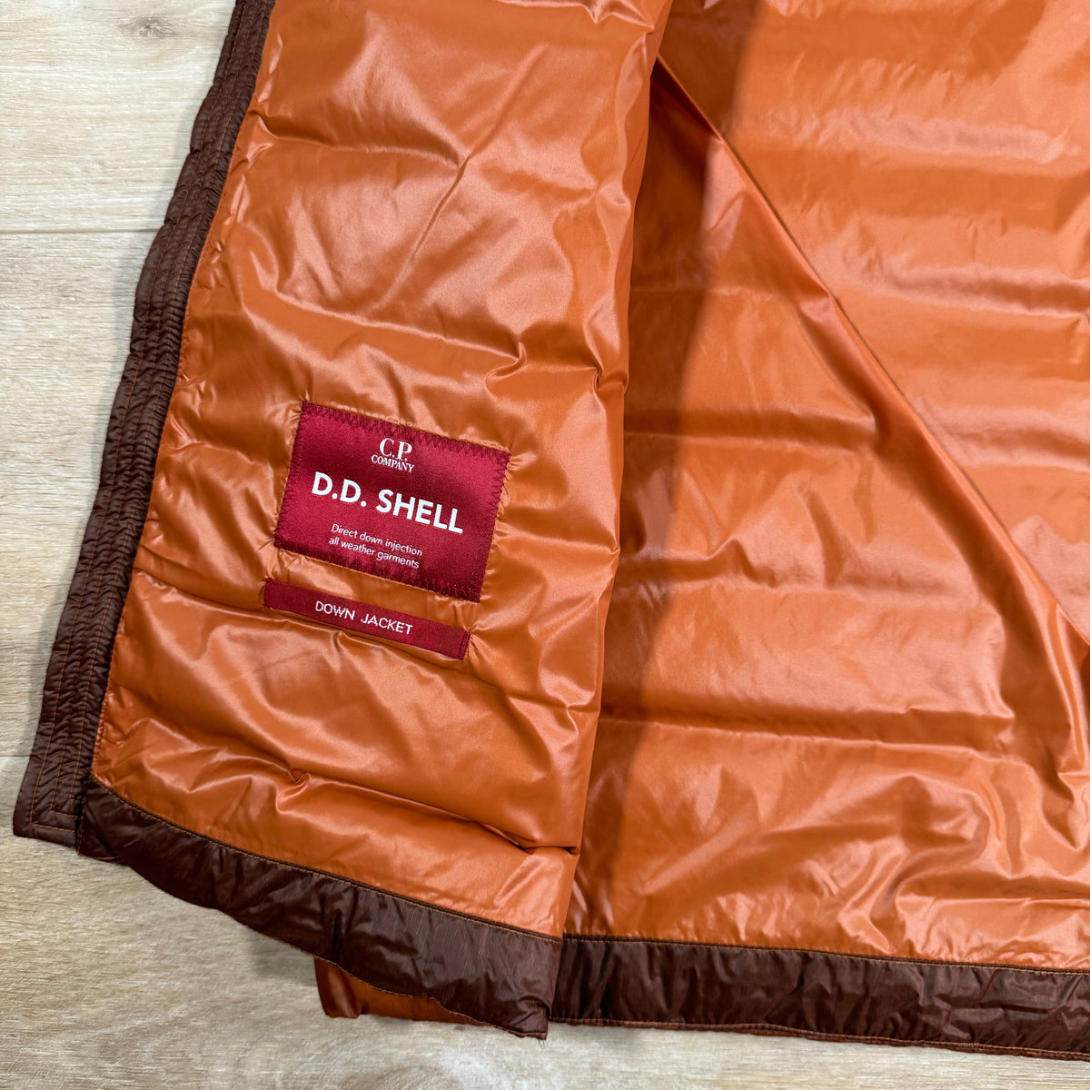 CP Company DD Shell Goggle Down Vest in Bombay Brown Castmark
