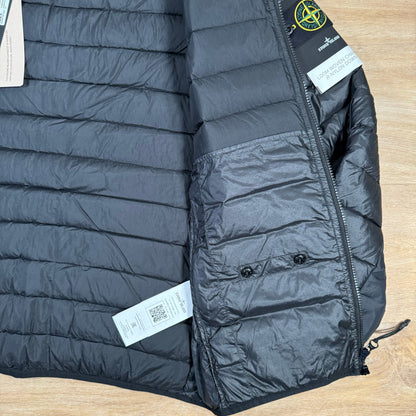 Stone Island Loom Woven Chambers Nylon Down-TC Jacket in Black Castmark