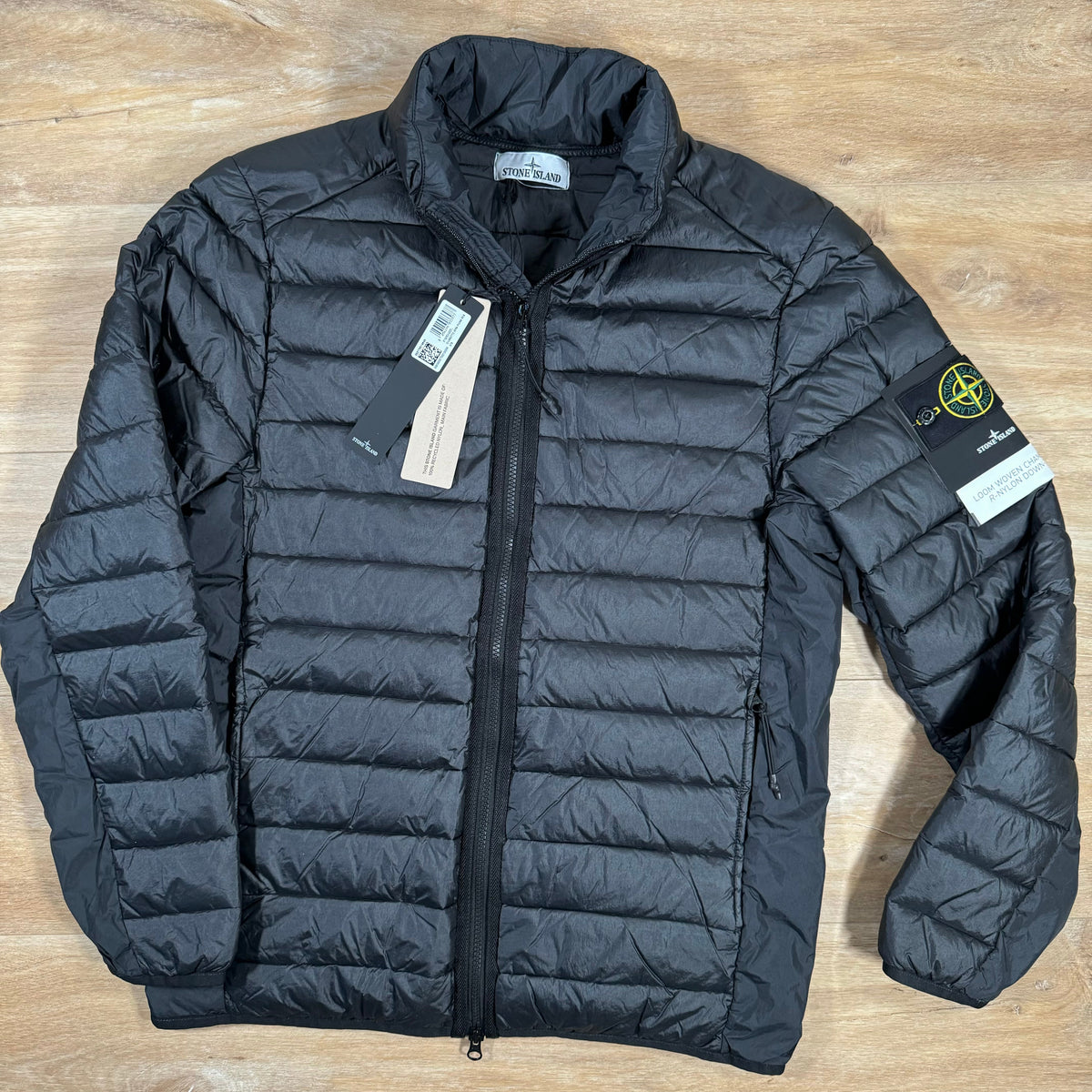 Stone Island Loom Woven Chambers Nylon Down-TC Jacket in Black Castmark