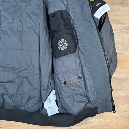 Stone Island Crinkle Reps NY Padded Jacket in Lead Grey Castmark