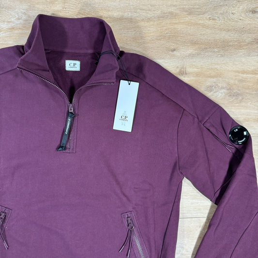 CP Company Diagonal Raised Half-Zipped Lens Sweatshirt in Potent Purple Castmark