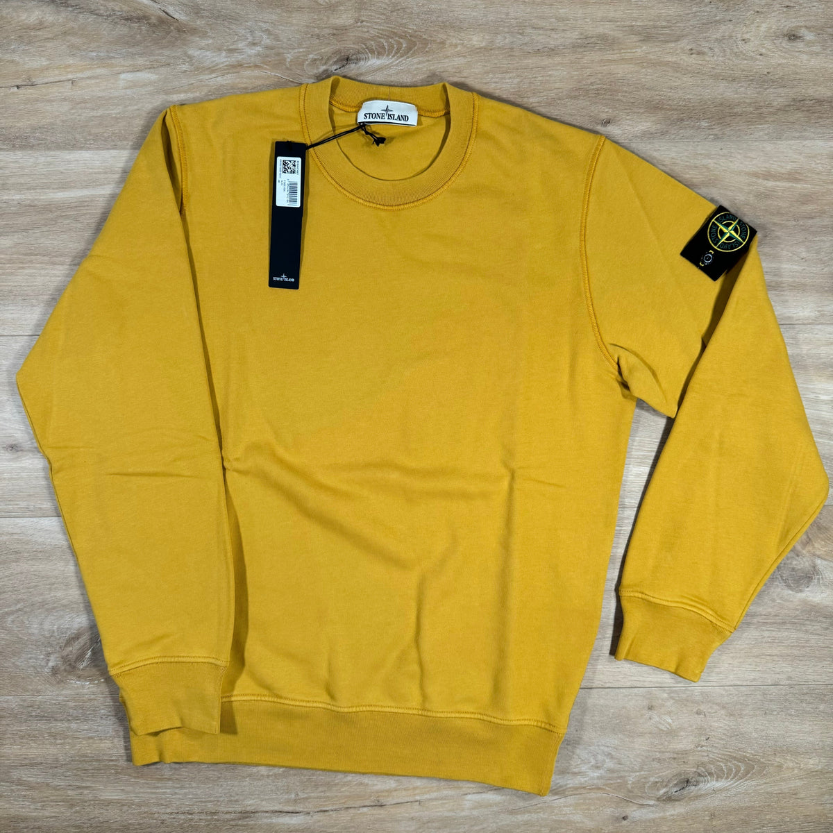 Stone Island Garment Dyed Crewneck Sweatshirt in Mustard Castmark