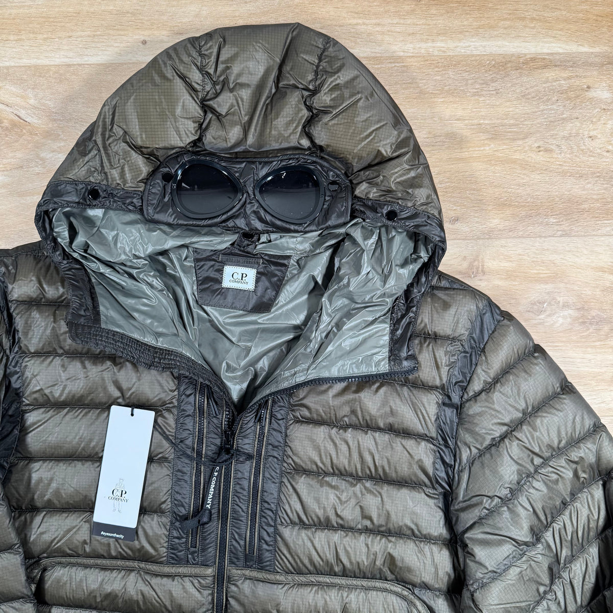 CP Company DD Shell Goggle Down Jacket in Grape Leaf Castmark