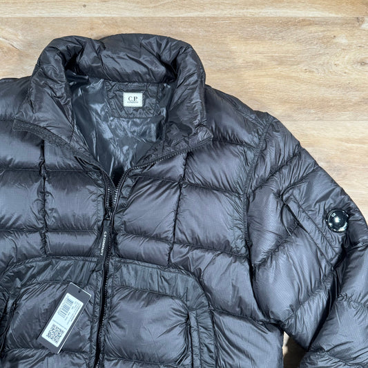 CP Company Short Down Lens Jacket in Black Castmark