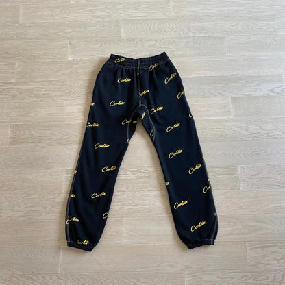 CORTEIZ All Over Print Joggers - Black/Yellow