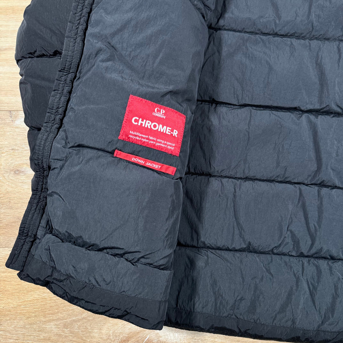 CP Company Chrome-R Down Lens Jacket in Black Castmark
