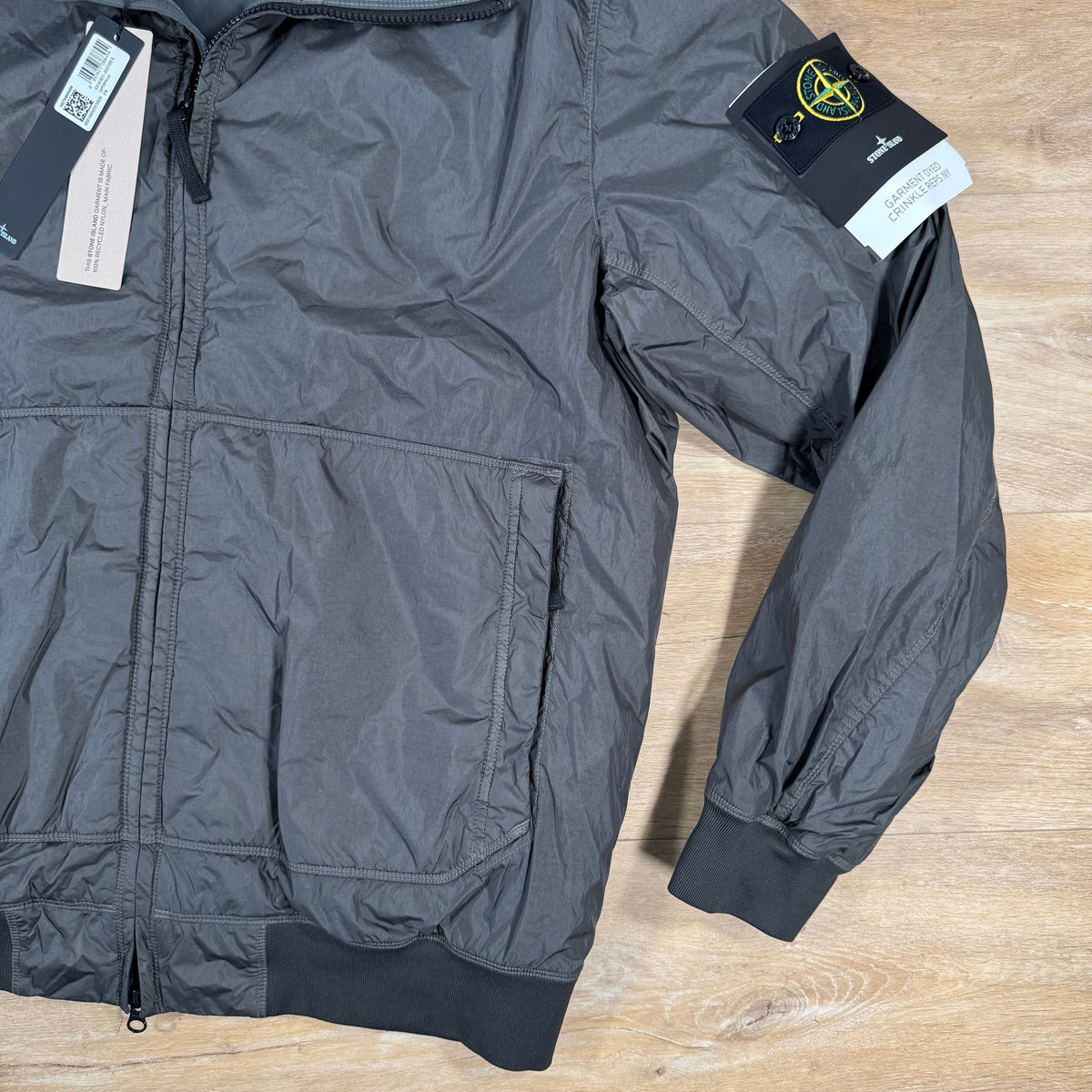 Stone Island Crinkle Reps NY Padded Jacket in Lead Grey Castmark