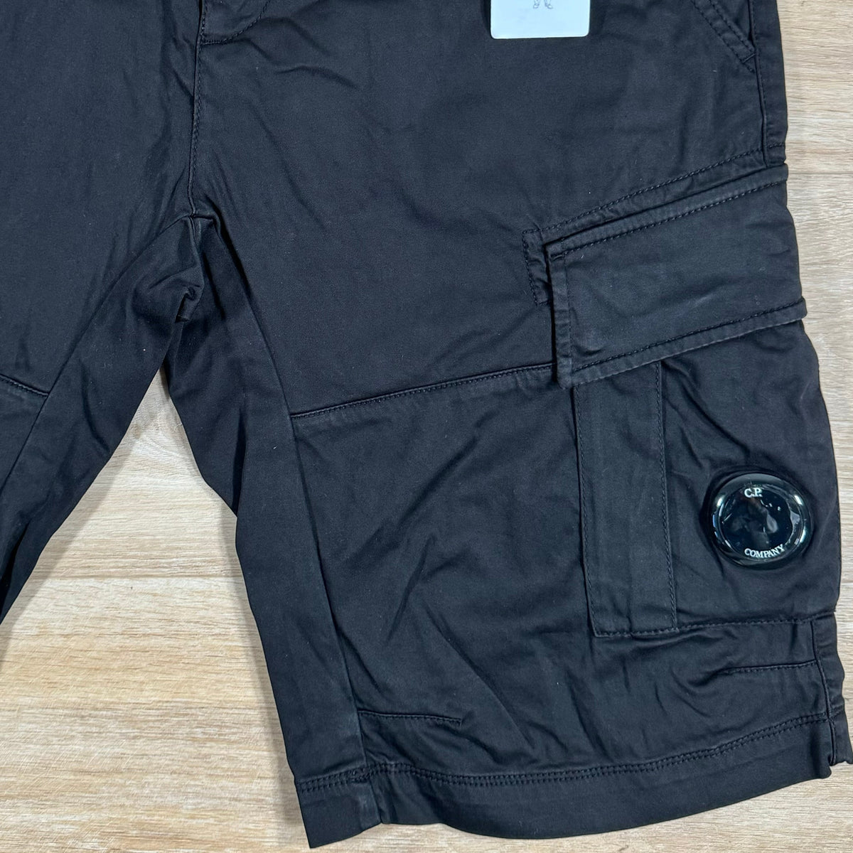 CP Company Stretch Sateen Lens Cargo Shorts in Black Castmark
