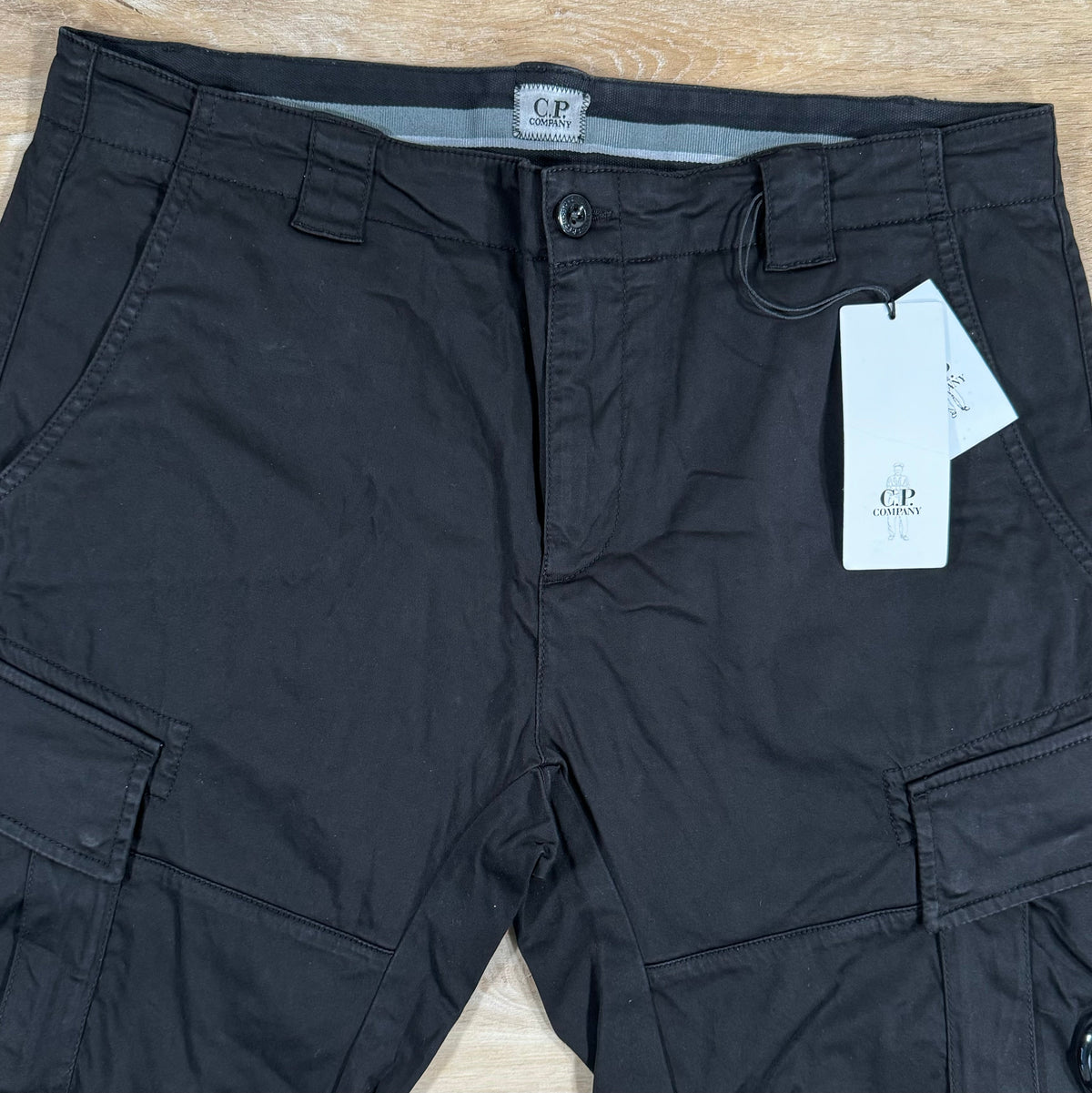 CP Company Stretch Sateen Lens Cargo Shorts in Black Castmark
