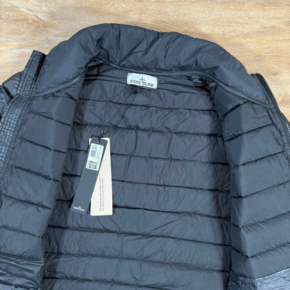Stone Island Loom Woven Chambers Nylon Down-TC Jacket in Black Castmark