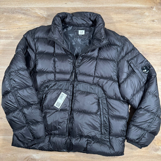 CP Company Short Down Lens Jacket in Black Castmark