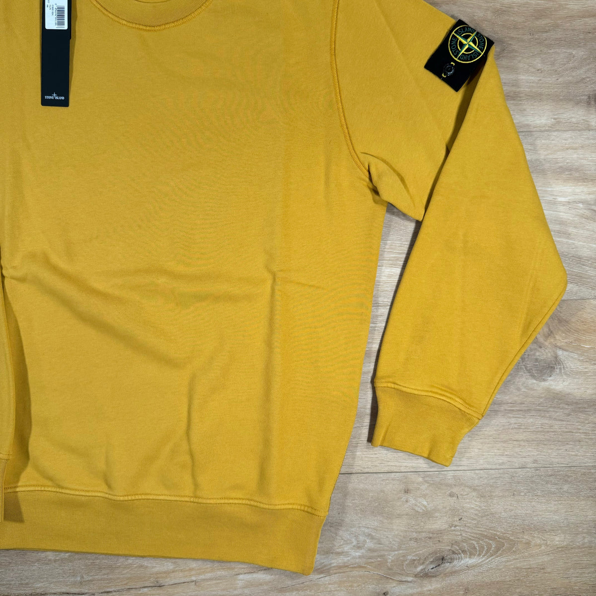 Stone Island Garment Dyed Crewneck Sweatshirt in Mustard Castmark