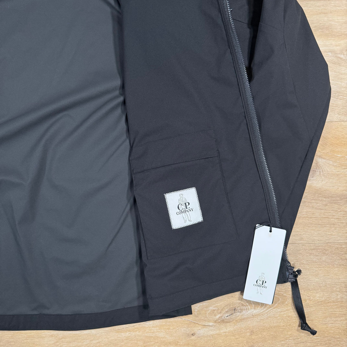 CP Company Pro-Tek Lens Jacket in Black Castmark
