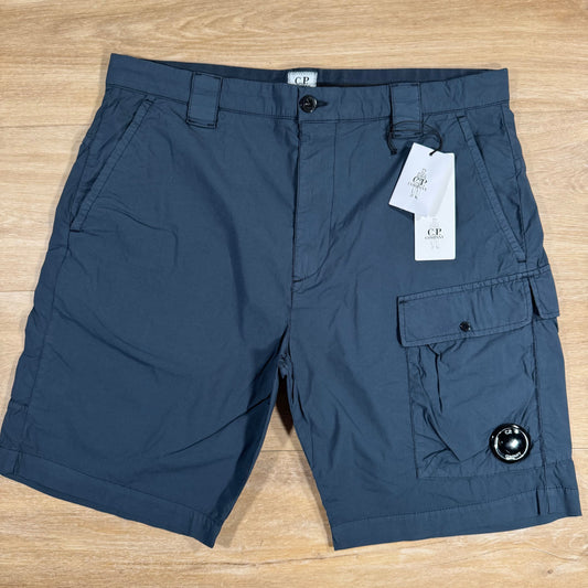 CP Company 50 Fili Stretch Cargo Shorts in India Ink Castmark