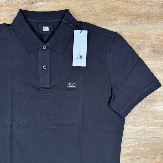 CP Company Stretch Piquet Logo Polo Shirt in Black Castmark