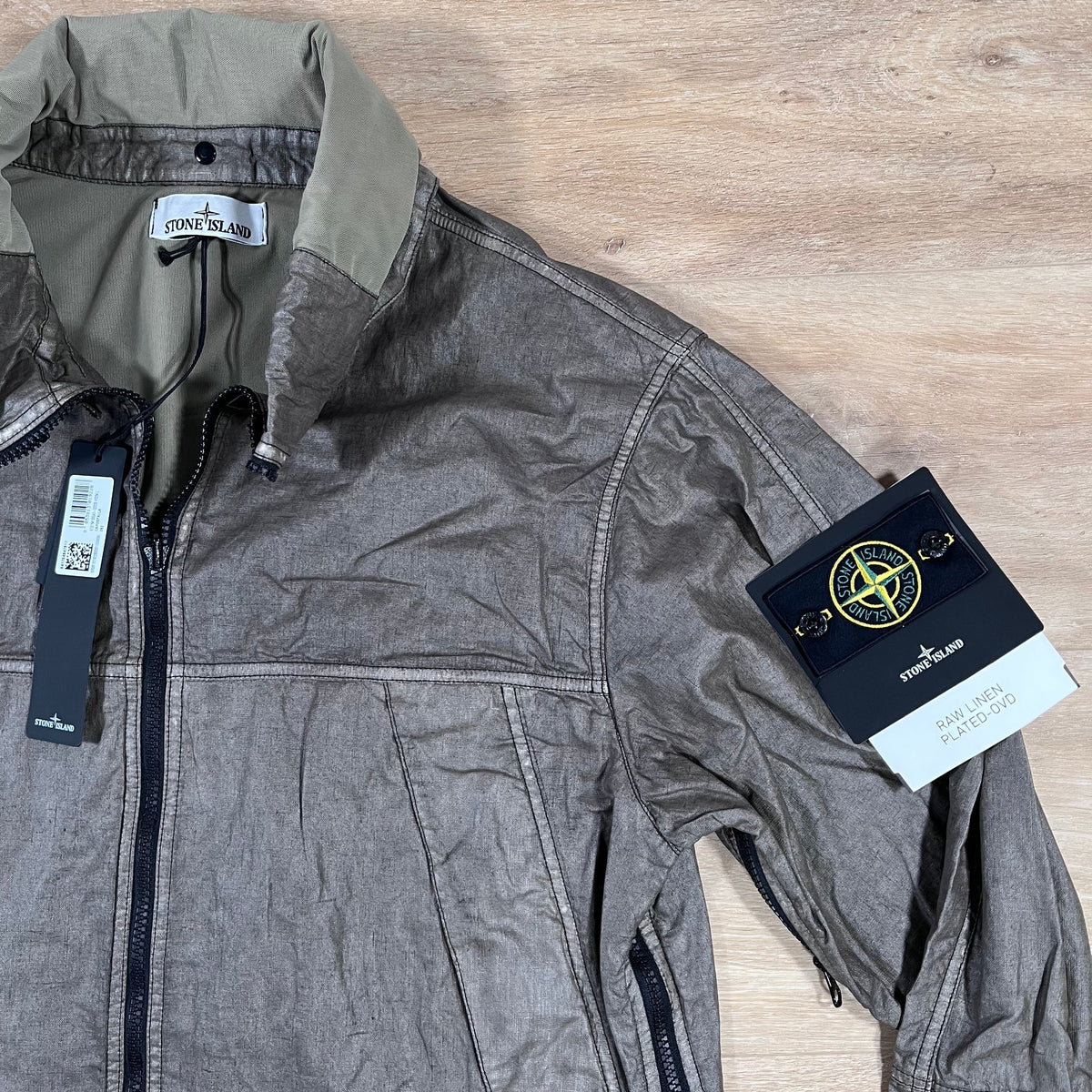 Stone Island Raw Linen Plated-OVD Jacket in Military Green Castmark