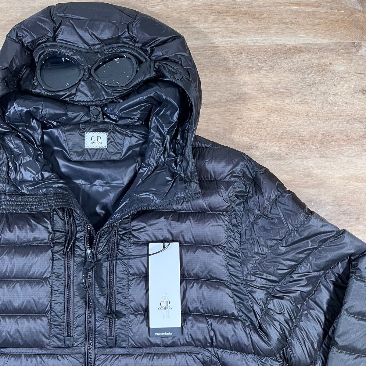 CP Company DD Shell Goggle Down Jacket in Black Castmark