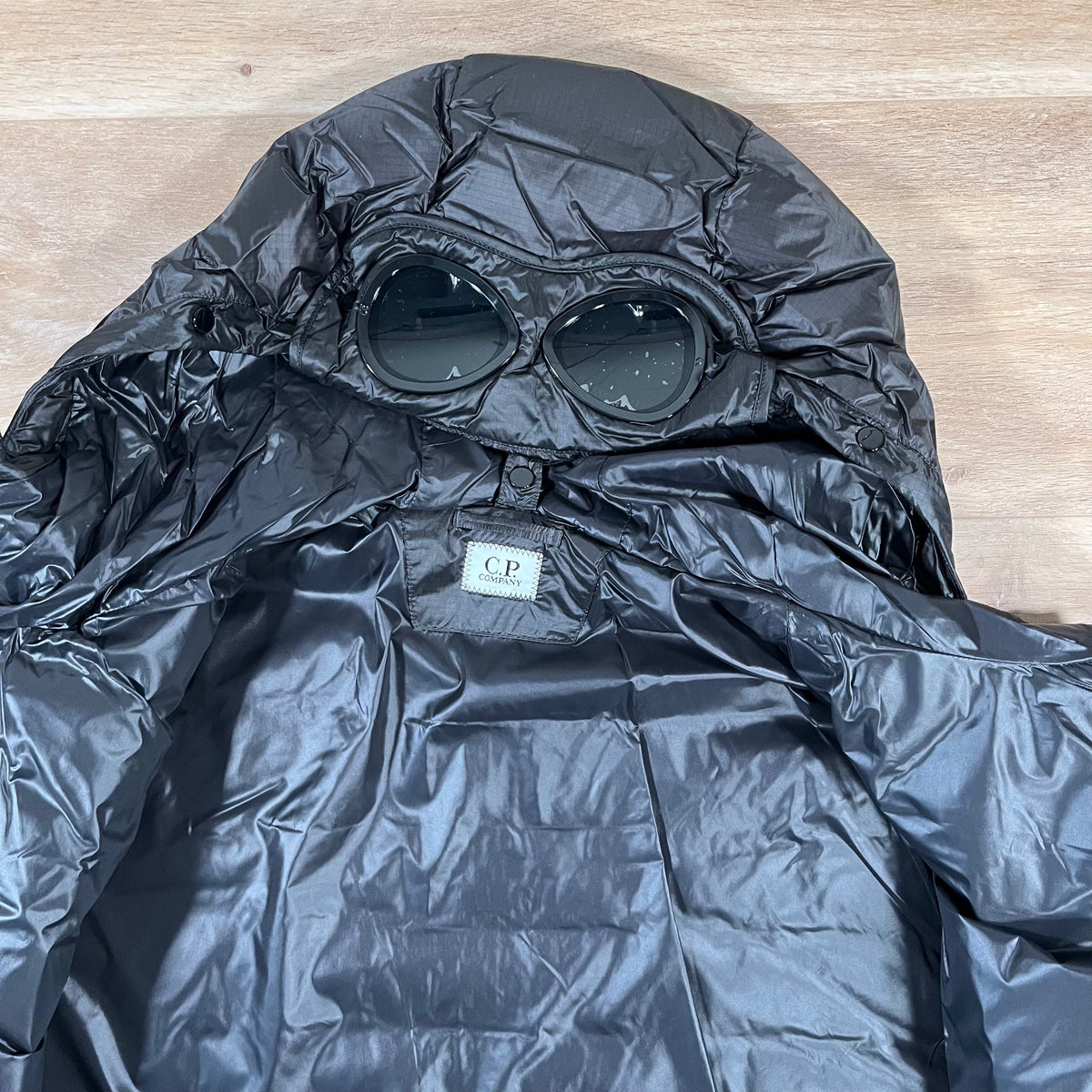 CP Company DD Shell Goggle Down Jacket in Black Castmark