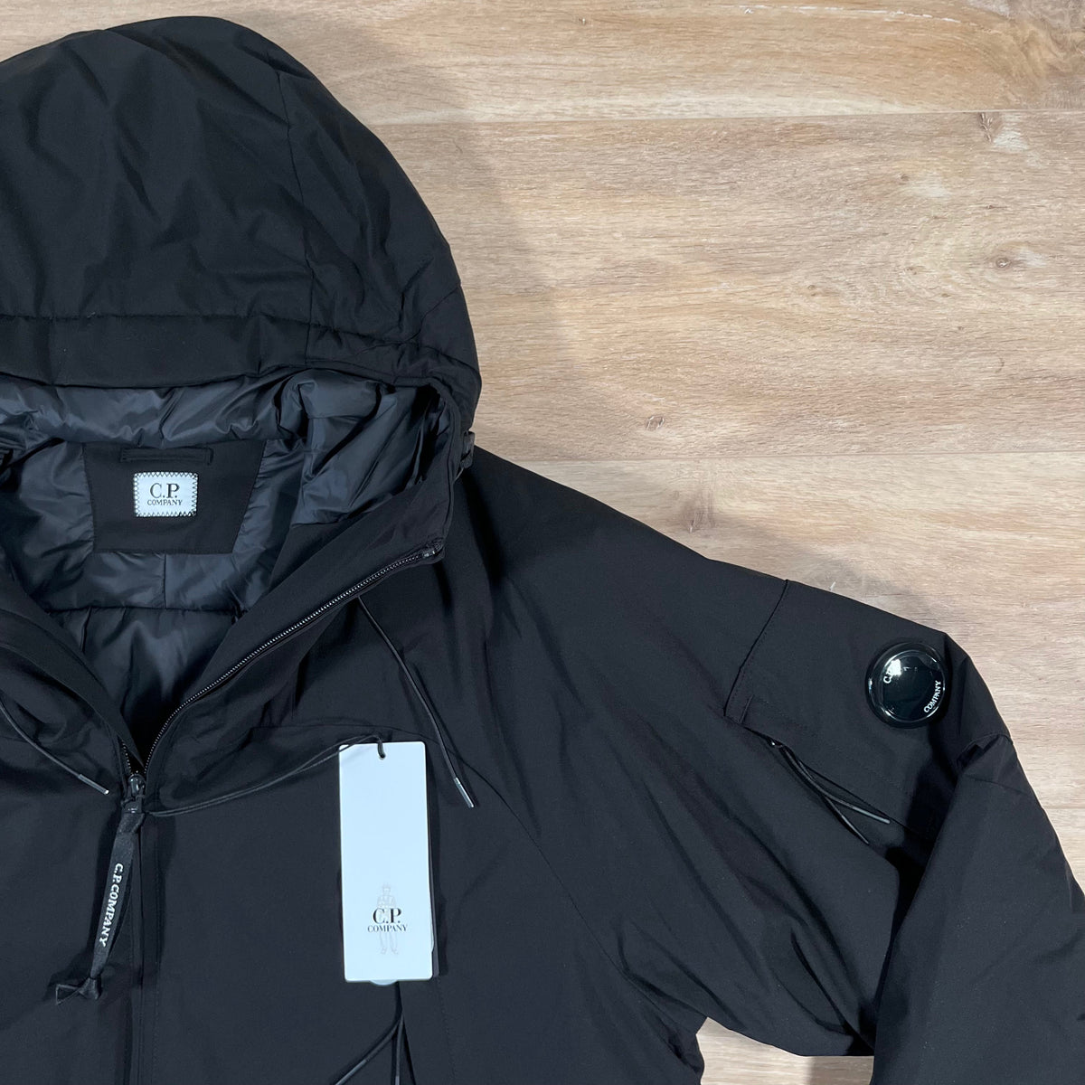CP Company Pro-Tek Padded Lens Jacket in Black Castmark