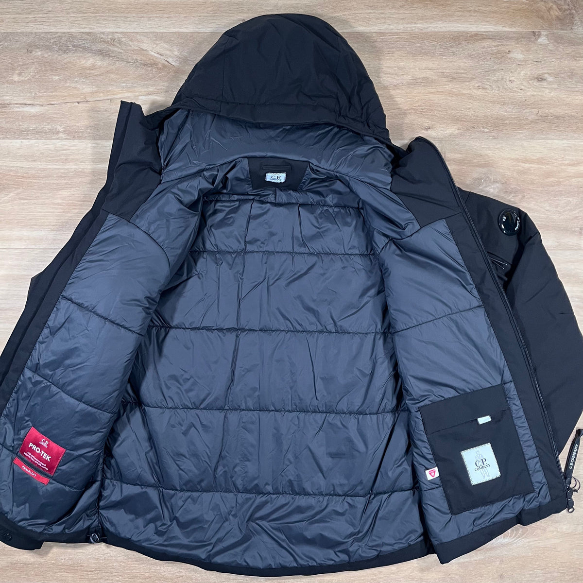CP Company Pro-Tek Padded Lens Jacket in Black Castmark