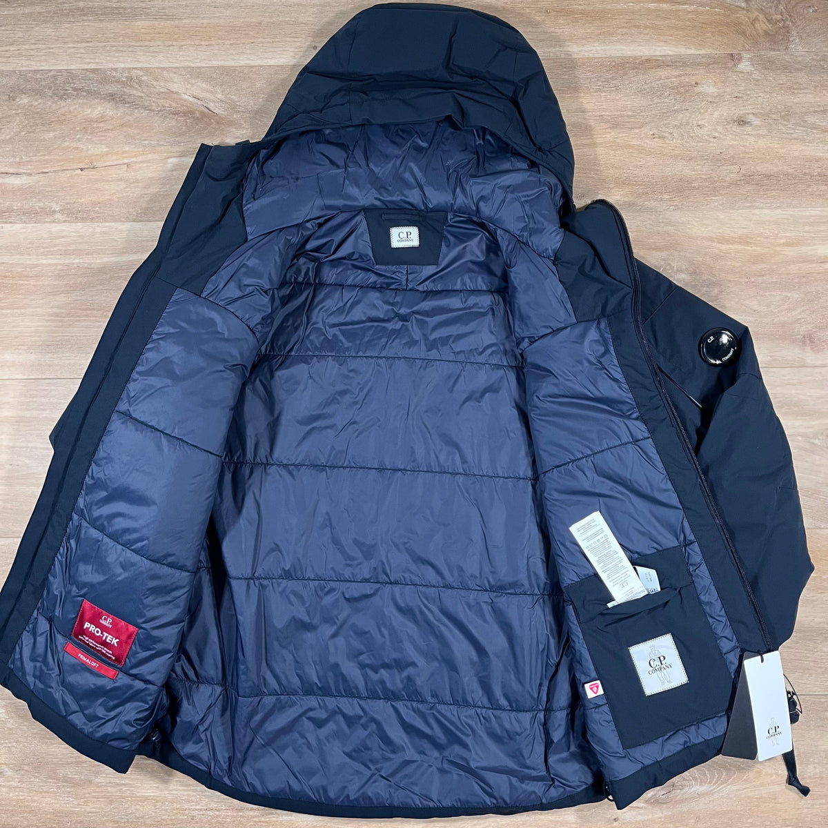 CP Company Pro-Tek Padded Lens Jacket in Navy Castmark