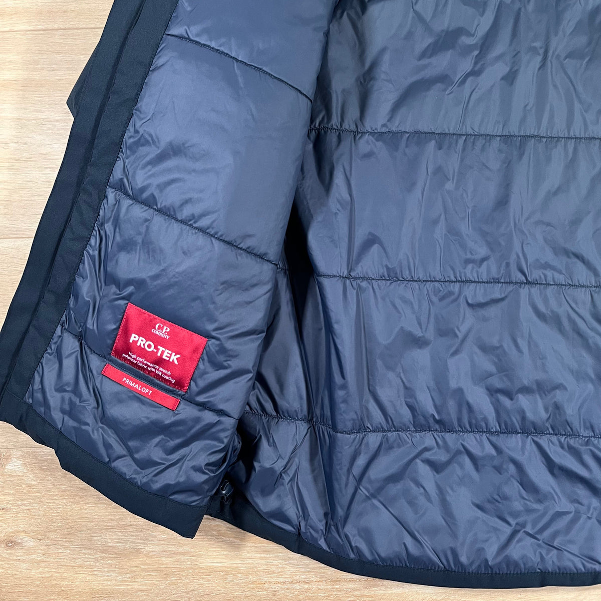 CP Company Pro-Tek Padded Lens Jacket in Navy Castmark