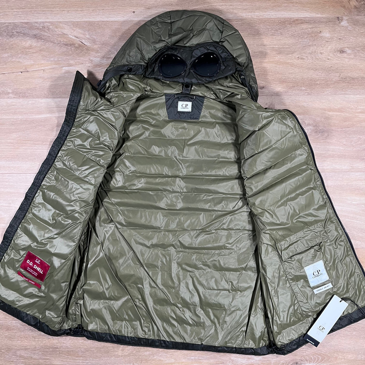 CP Company DD Shell Goggle Down Gilet in Elmwood Green Castmark