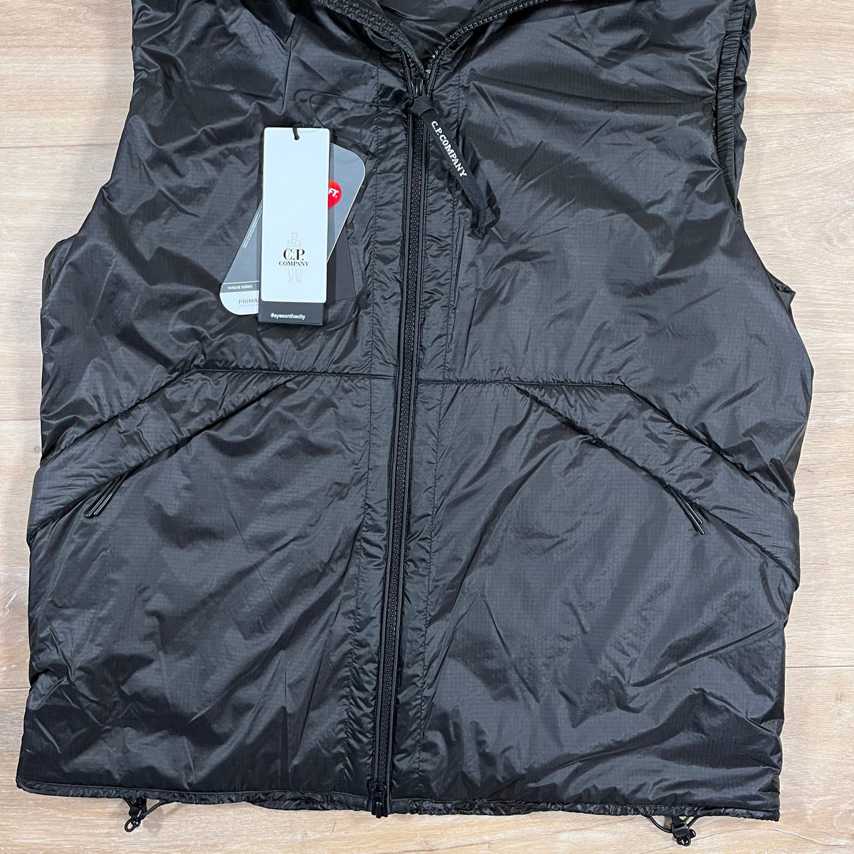 CP Company Nada Shell Goggle Padded Gilet in Black Castmark