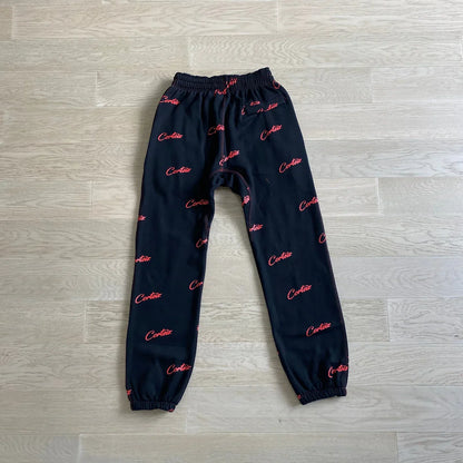 CORTEIZ All Over Print Joggers - Black/Red