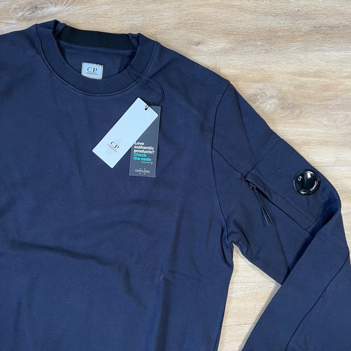 CP Company Diagonal Raised Lens Sweatshirt in Navy Castmark